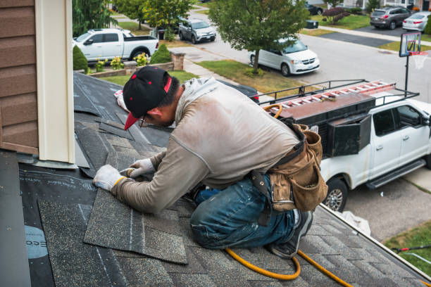Professional Storm Damage Roof Repair technician working in Bath, ME